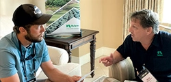 Photo of a one-on-one meeting held during the LM Growth Summit