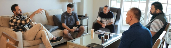 Photo of a one-on-one meeting during a recent LM Growth Summit